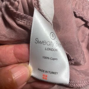 Sweaty Betty Pants & Jumpsuits - Sweaty Betty pink silk wide leg track pants. #WFH Sweaty Betty Pants & Jumpsuits - Sweaty Betty pink silk wide leg track pants. #WFH